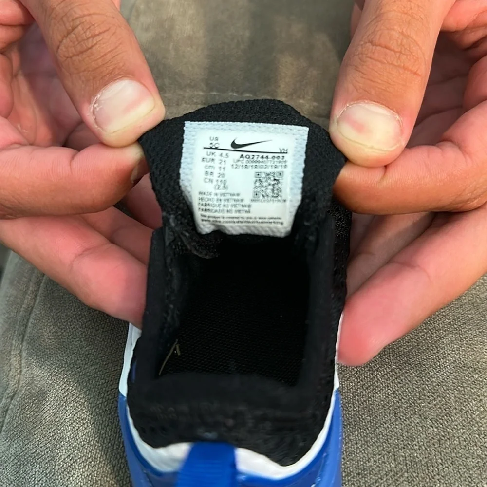 Nike Black and Blue Sneakers with Elastic Laces and Breathable Mesh